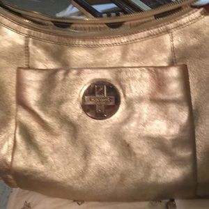 Gold Kate spade purse